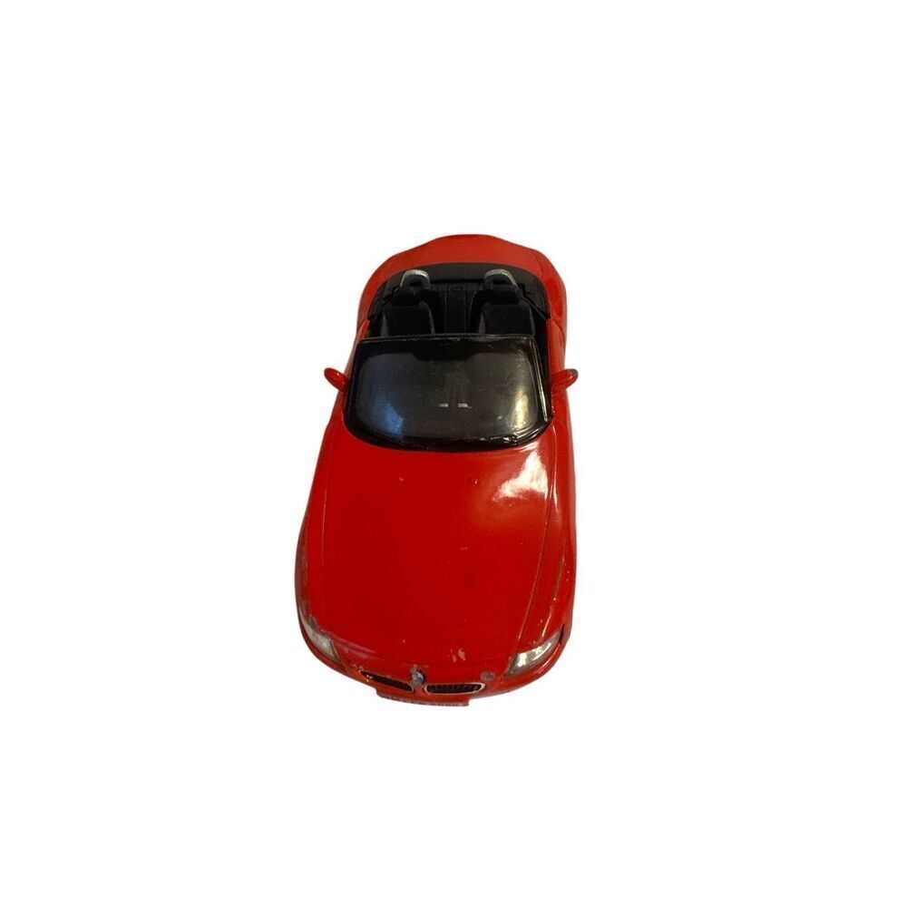 Sleek red convertible toy car